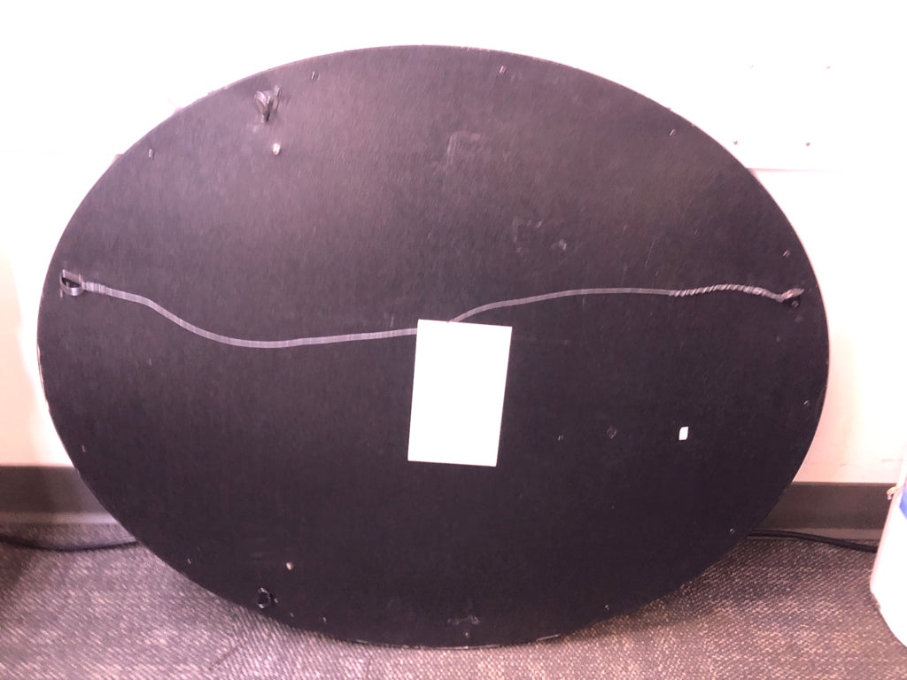 BLACK OVAL MIRROR W/ GOLD EDGE.