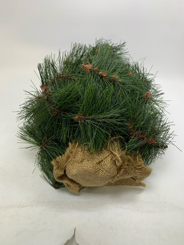 PINE TREE W/ BURLAP BASE.