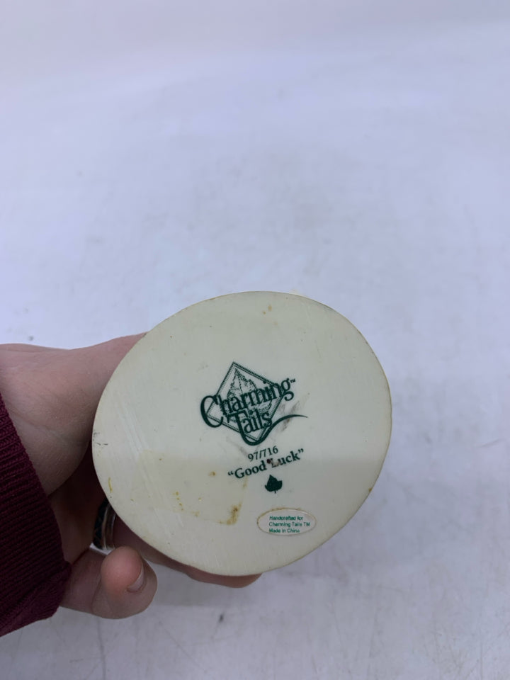 RESIN GOOD LUCK MOUSE HOLDING CLOVERS.