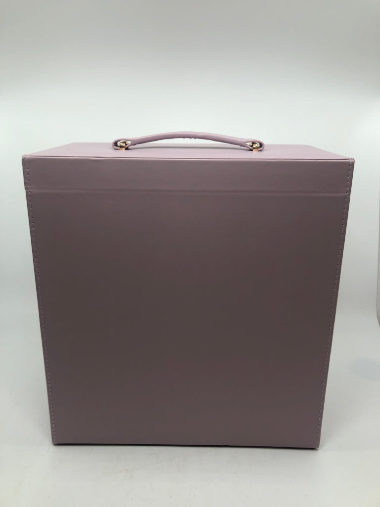 4 DRAWER PURPLE FAUX LEATHER JEWELRY ORGANIZER W/FLIP TOP.