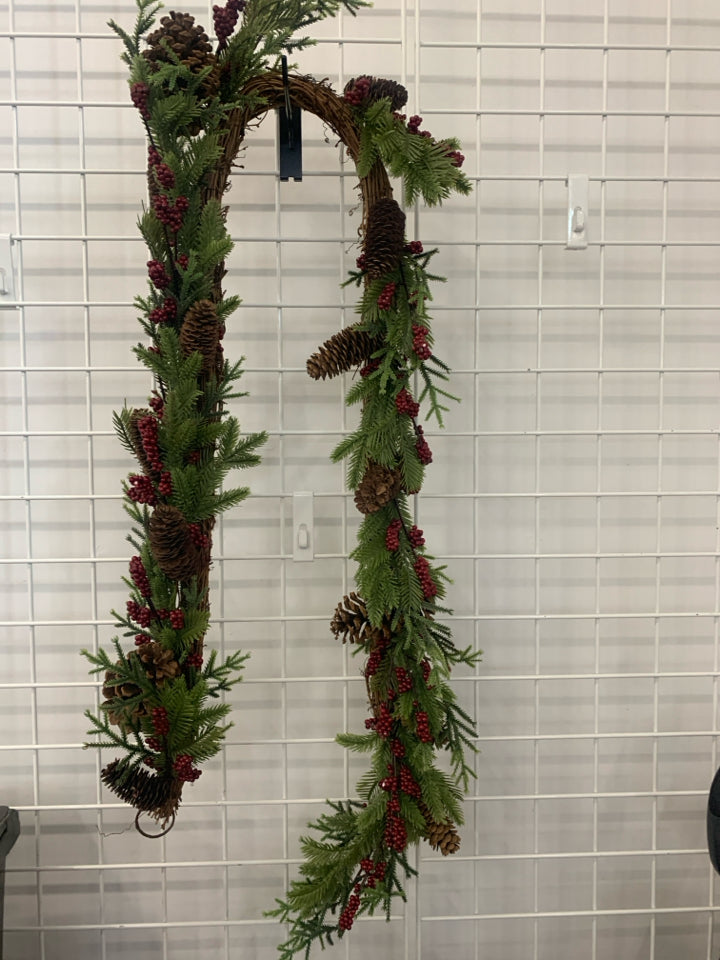 PINECONES AND RED PIP BERRY GARLAND.