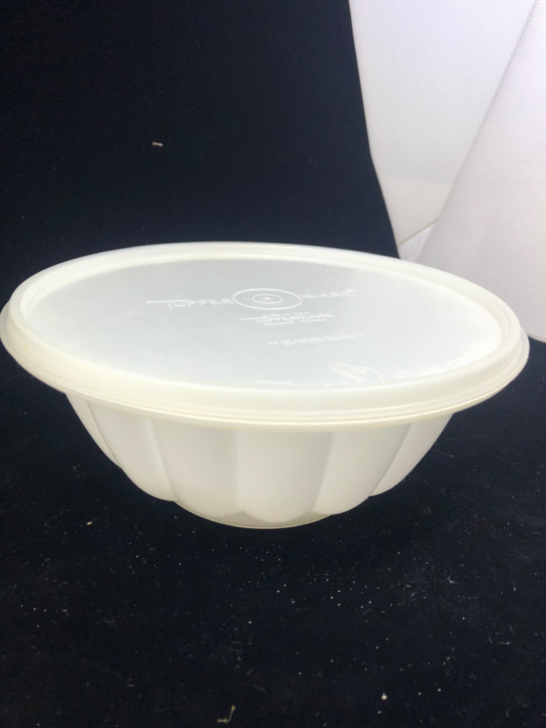 CLEAR TUPPERWARE JELLO MOLD.