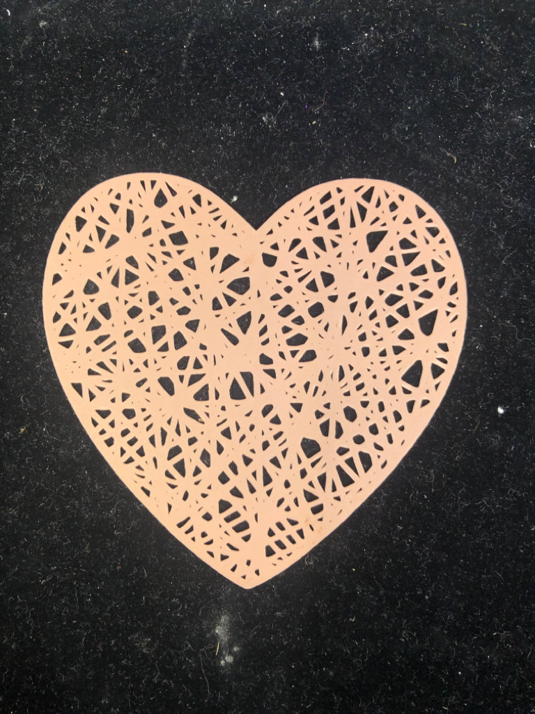 RUBBER HEART DOILY.