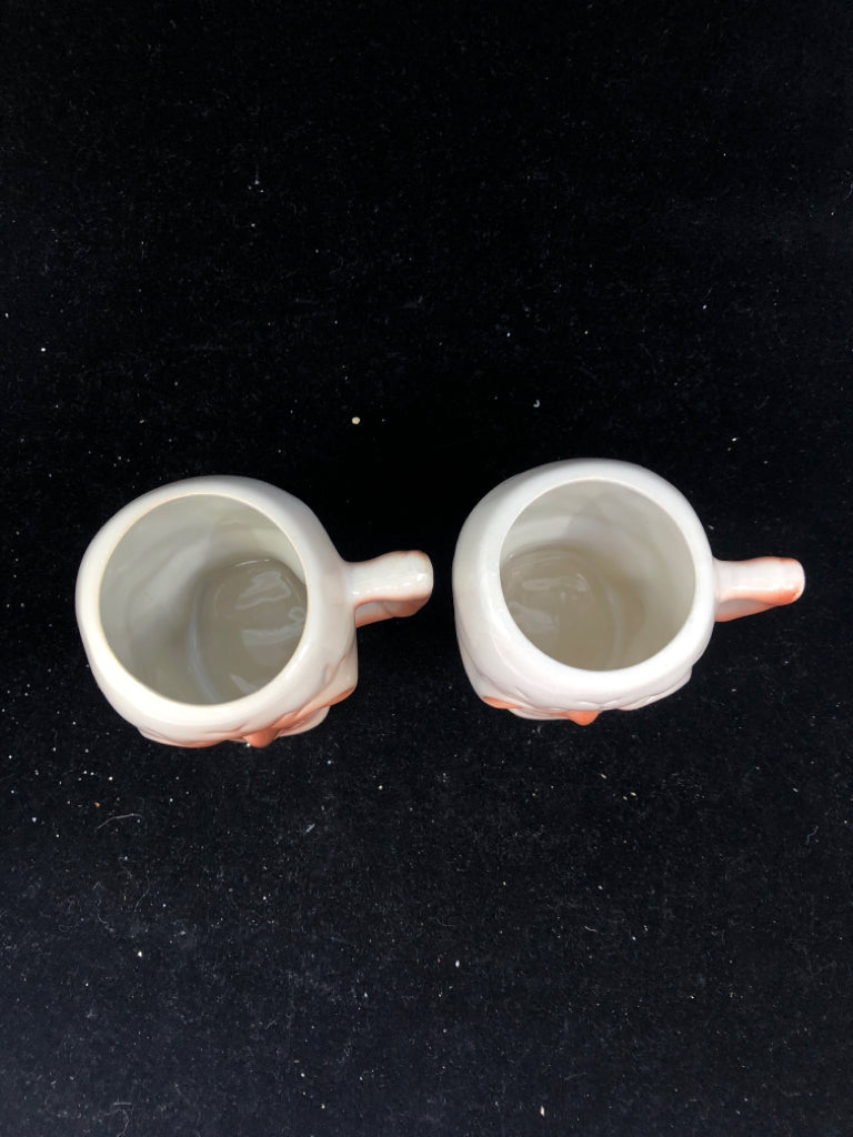 2 VTG SKULL MUGS.