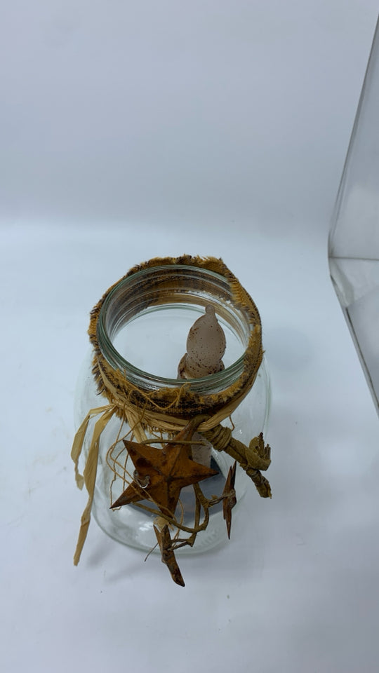 MASON JAR W/ LED CANDLESTICK AND METAL STARS.