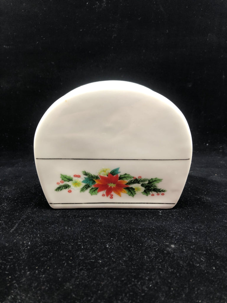 WHITE POINSETTIA NAPKIN HOLDER.