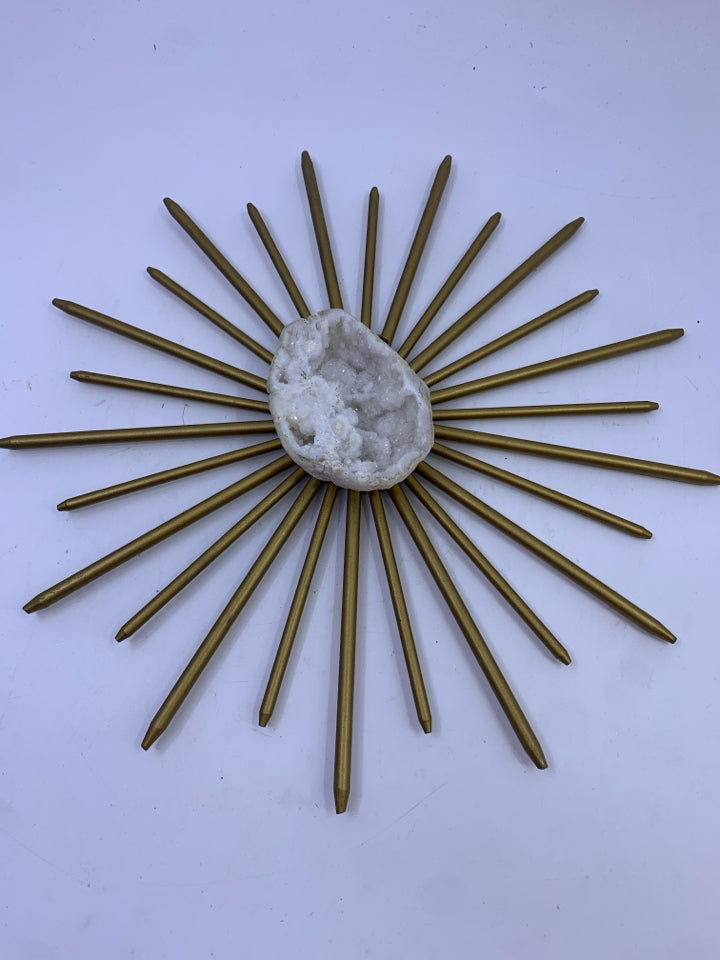 SMALL BRASS STARBURST W/ WHITE QUARTZ ROCK.