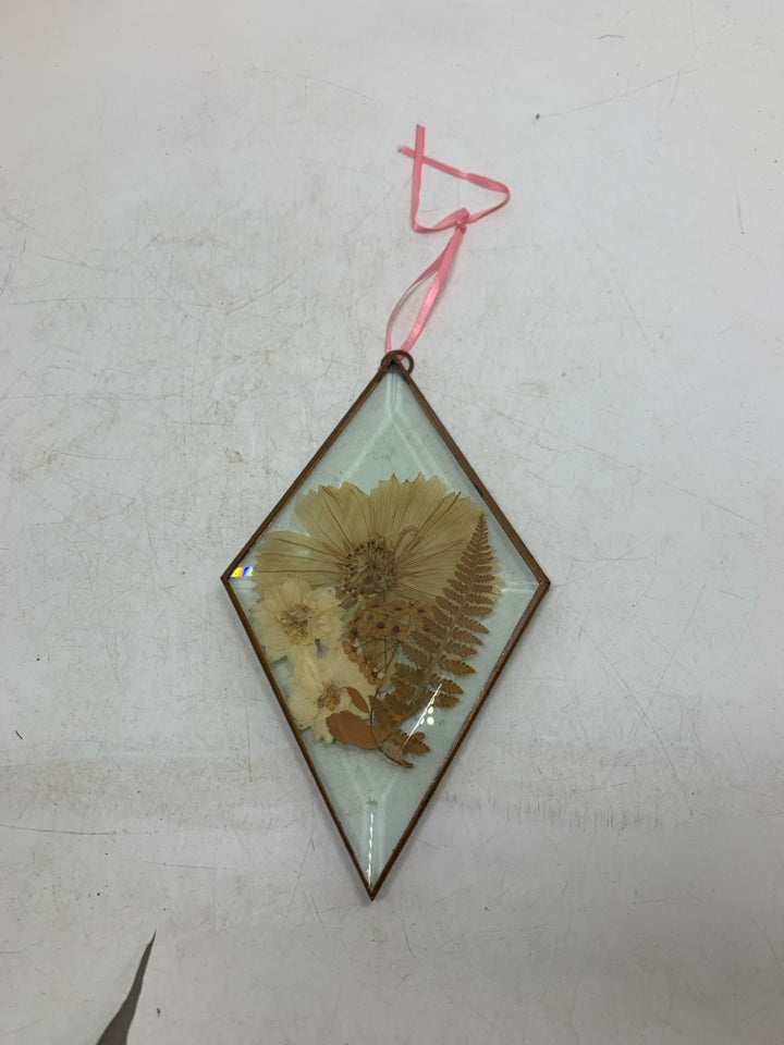 DIAMOND PATTERN GLASS W/ DRIED FLOWERS.