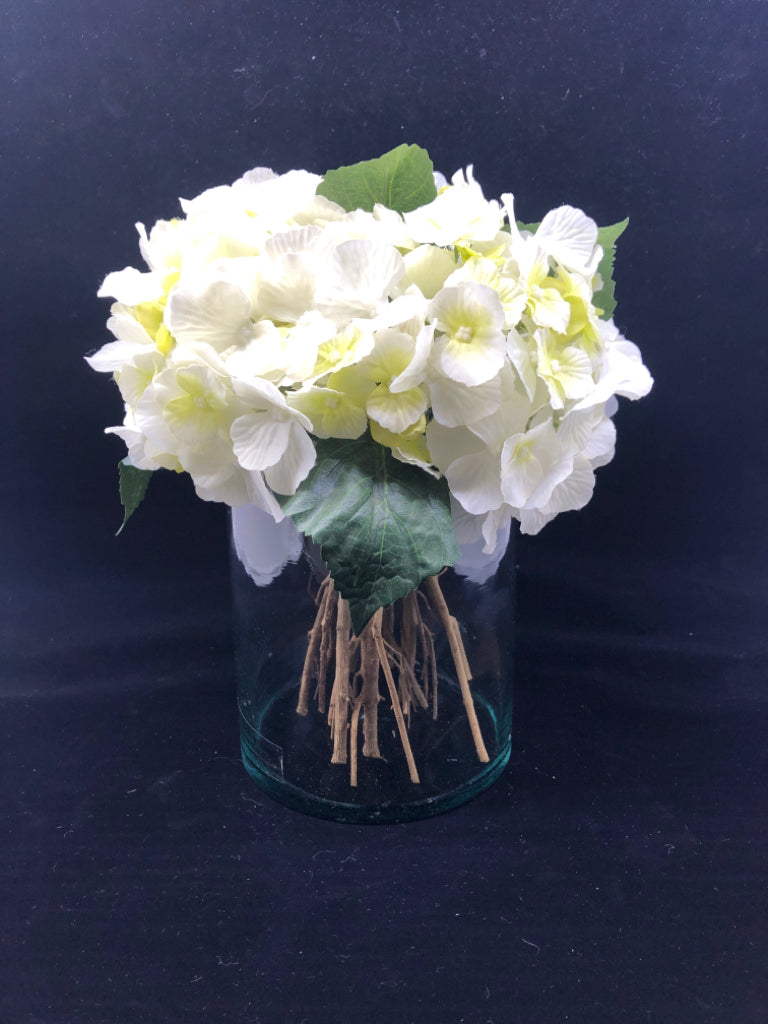 CYLINDER GLASS VASE W/WHITE HYDRANGEA FLOWERS.