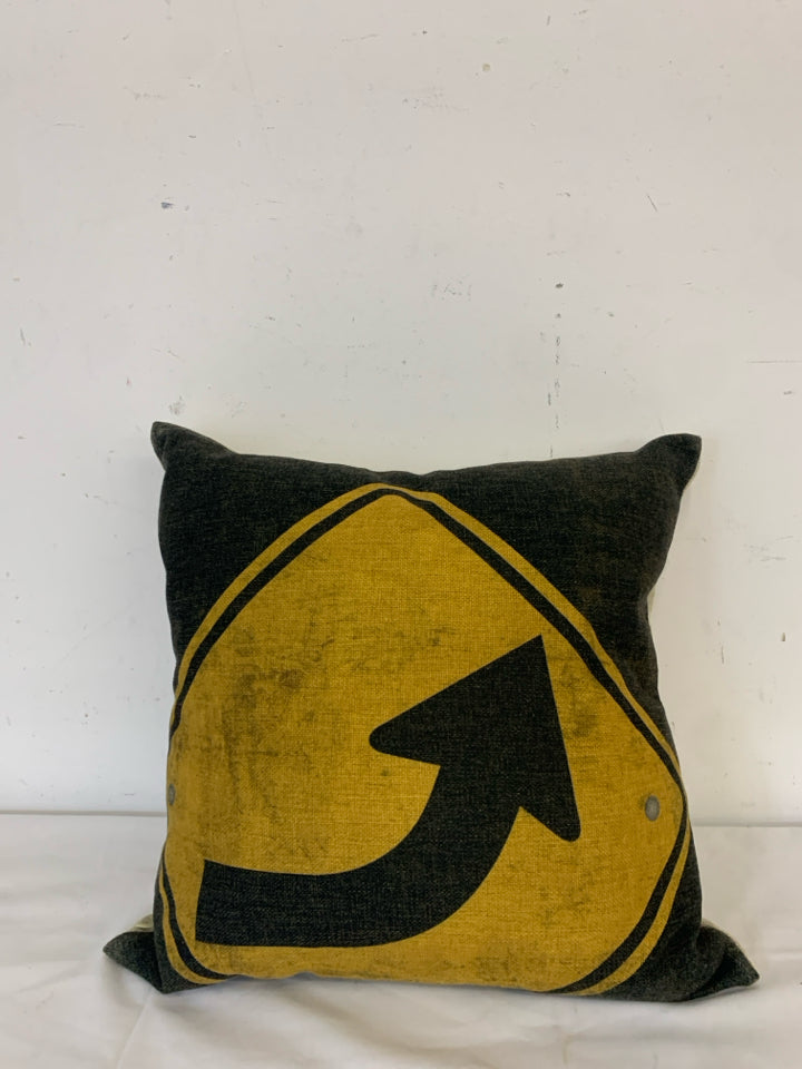 YELLOW TURN SIGN PILLOW.