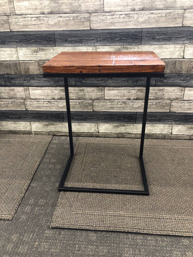 DARK WOOD SLIDE TABLE W METAL LEGS.