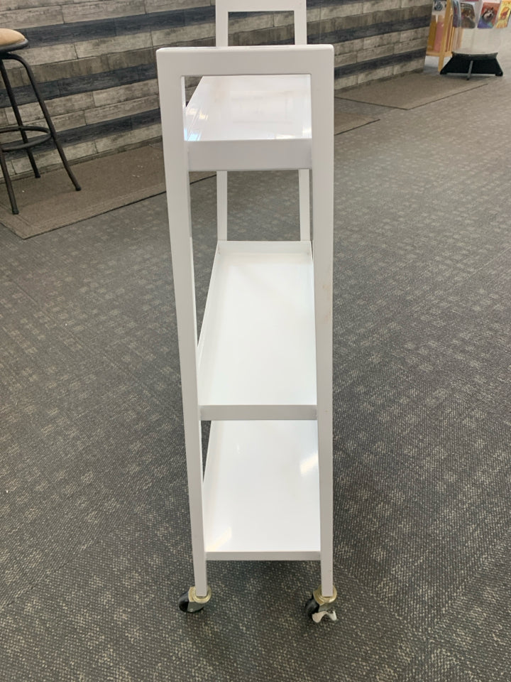 3 TIER WHITE ROLLING METAL SHELF.