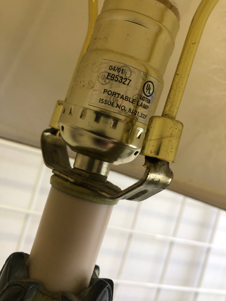 ORNATE CREAM LAMP W/DISTRESSED SHADE.