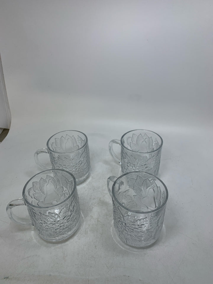 4 EMBOSSED ASSORTED FRUIT MUGS.