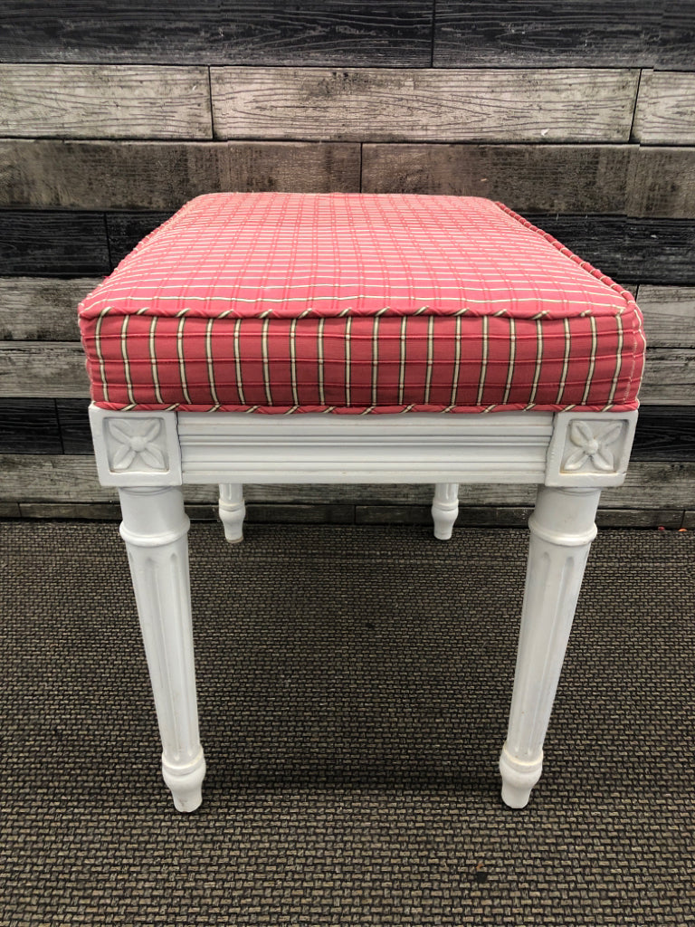 WHITE WOOD FOOTED STOOL W PINK AND GREEN CUSHION.