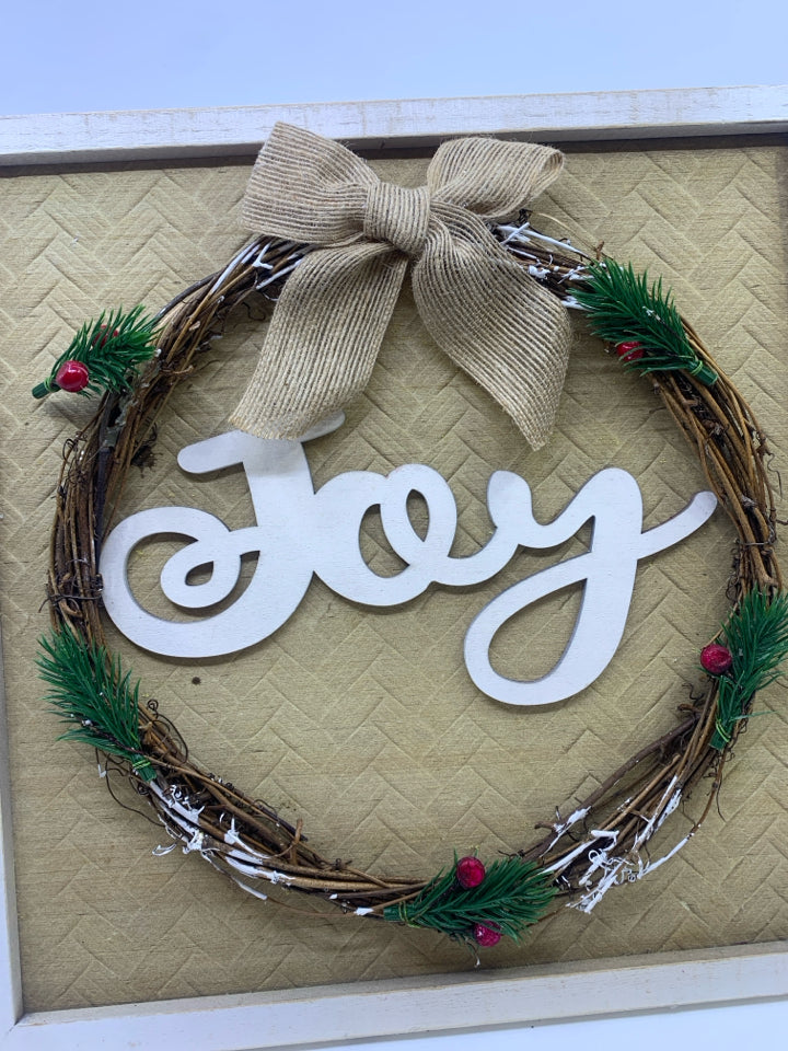 WHITE FRAMED JOY STAND OR WALL HANGING.
