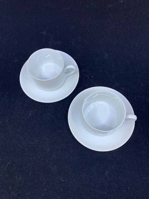 2 WHITE TEACUP AND SAUCERS.