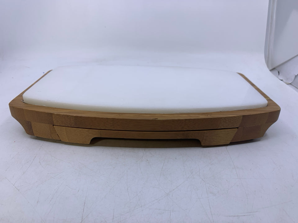 OVAL CHEESE BOARD W/ WHITE STONE TOP DRAWER W/ KNIFES.