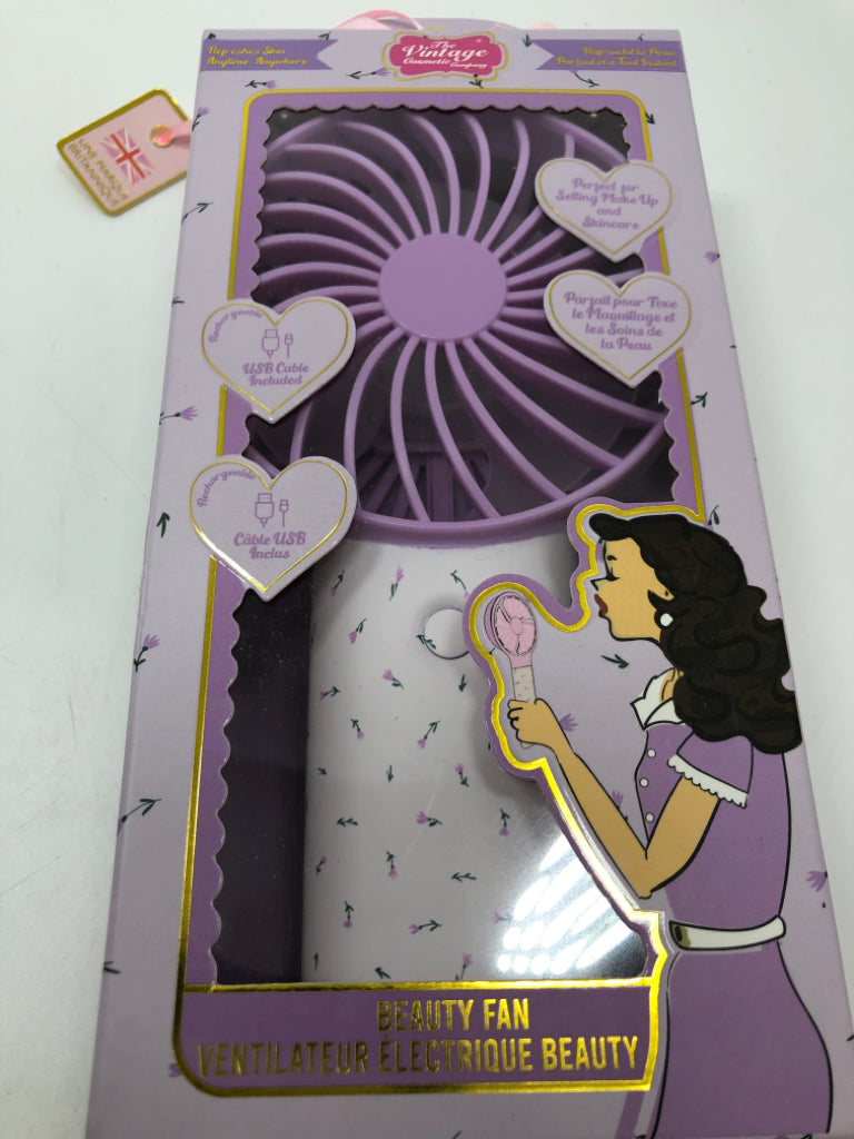 NIP PURPLE FLORAL BEAUTY FAN.