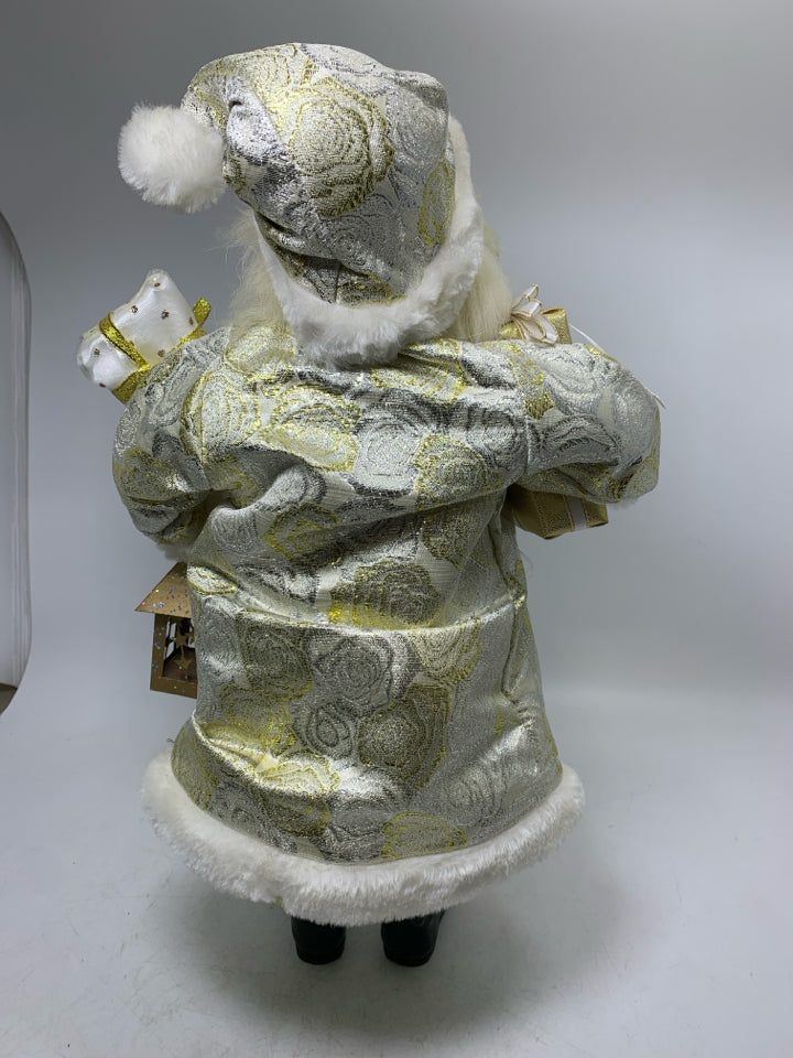 LIGHT WEIGHT SANTA DRESSED IN GOLD SUIT HOLDING PRESENTS/LANTERN.