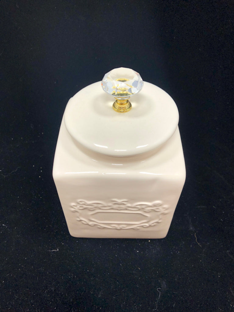 CREAM CERAMIC JAR W/JEWEL LID.