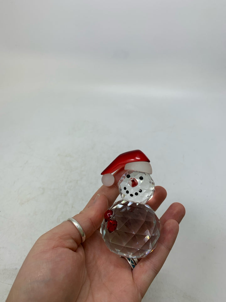 TEXTURED GLASS SNOWMAN W/ SANTA HAT.