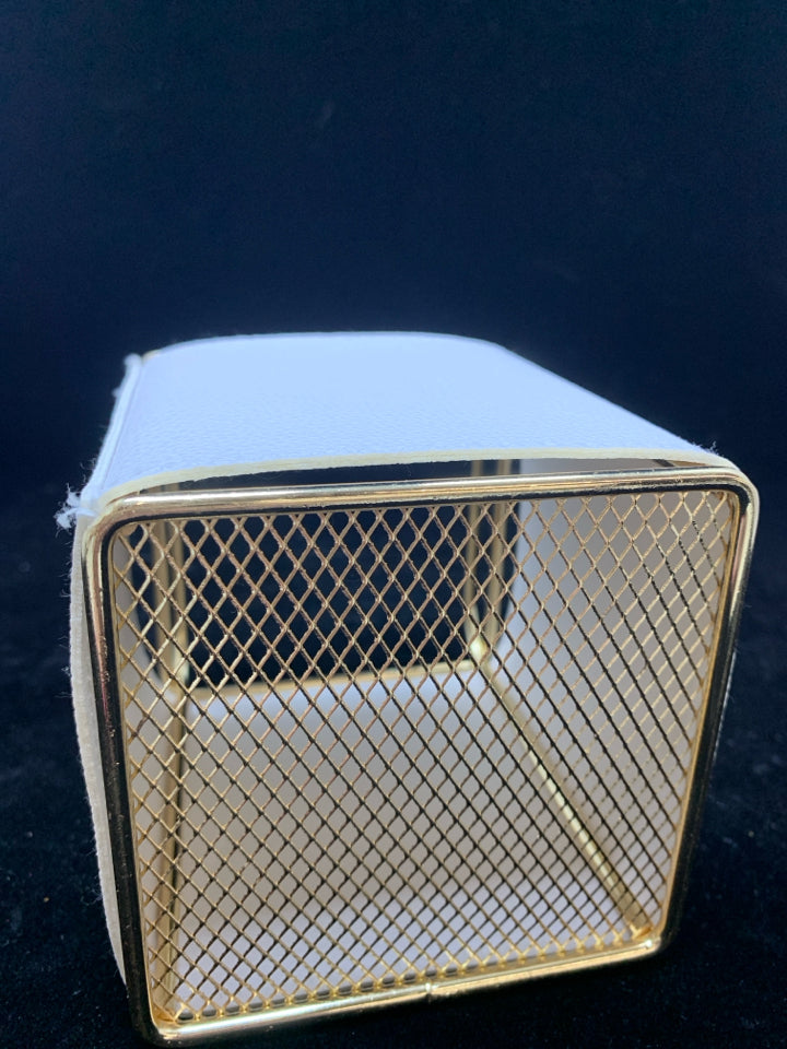 GOLD AND WHITE FAUX LEATHER DESK ORGANIZER.