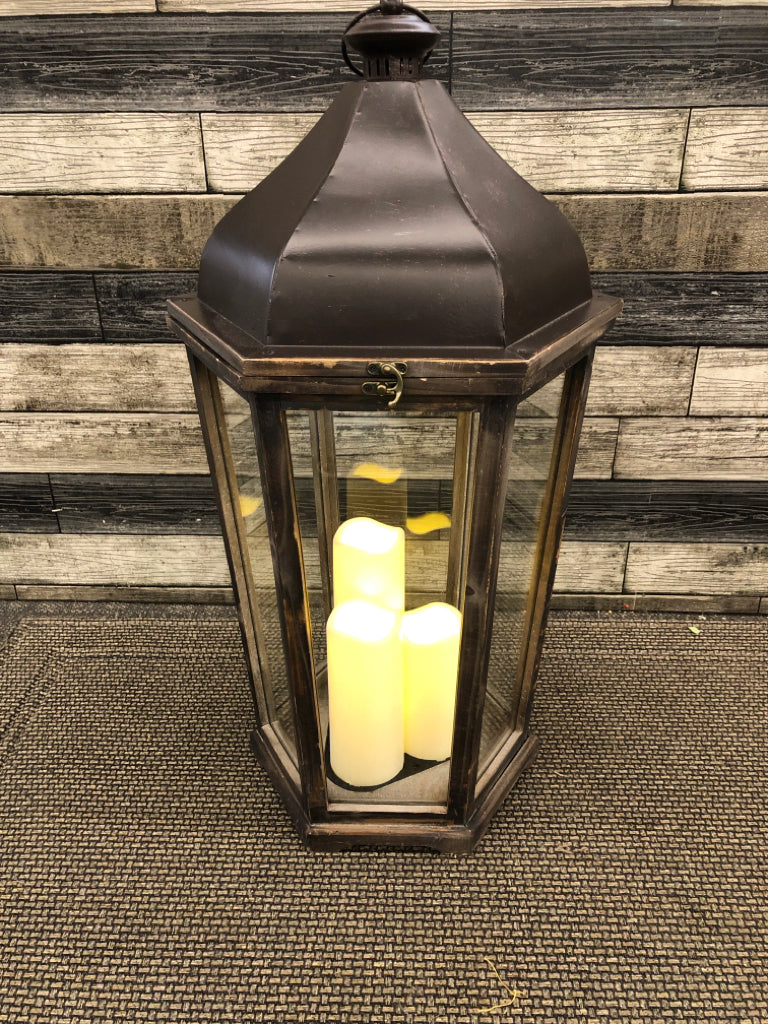 LARGE WOODEN LANTERN W/FAUX CANDLES.