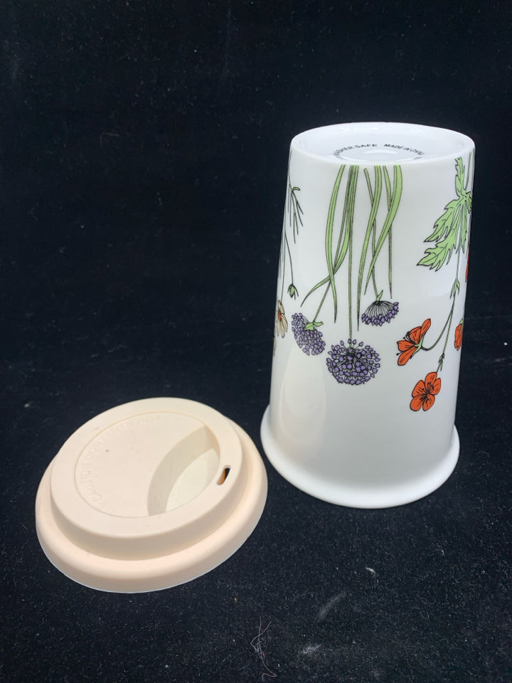 CERAMIC FLORAL TRAVEL MUG.