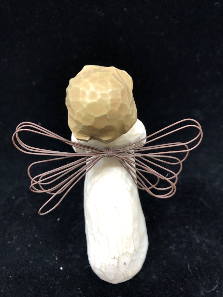 GIRL HOLDING BOOK ANGEL OF READING.