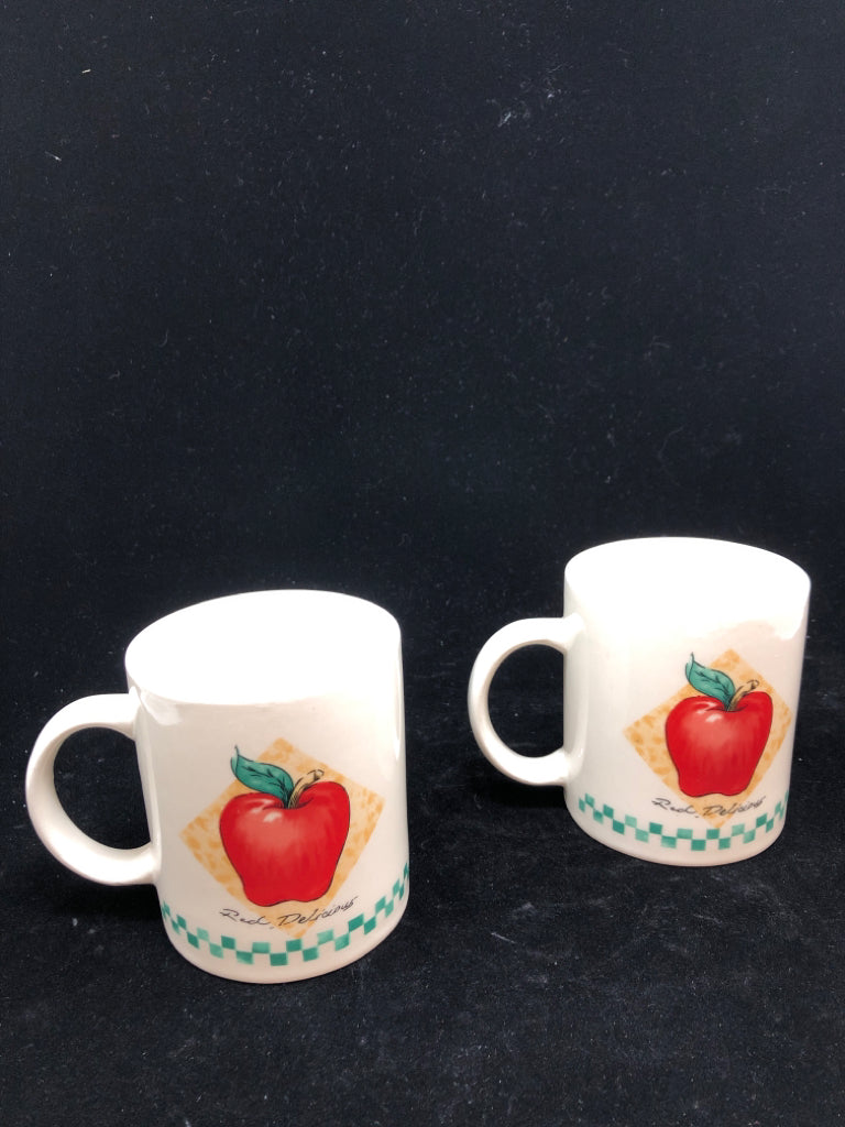 2 WHITE APPLE GREEN CHECKERED MUGS.