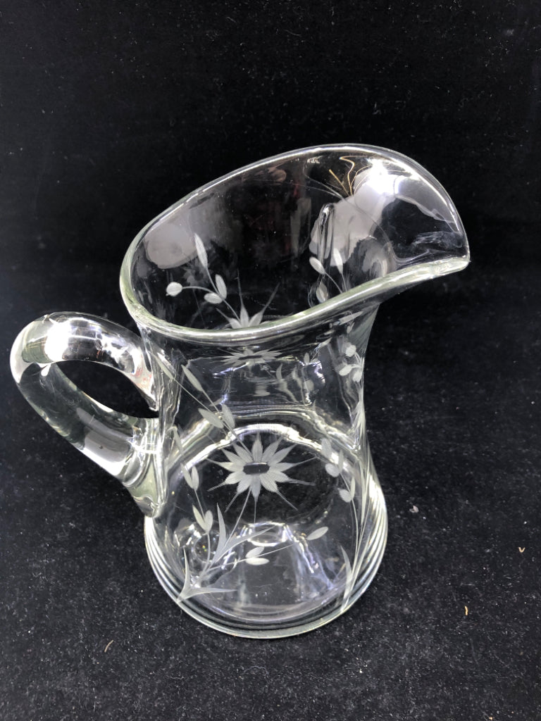 ETCHED FLORAL HEAVY GLASS PITCHER.