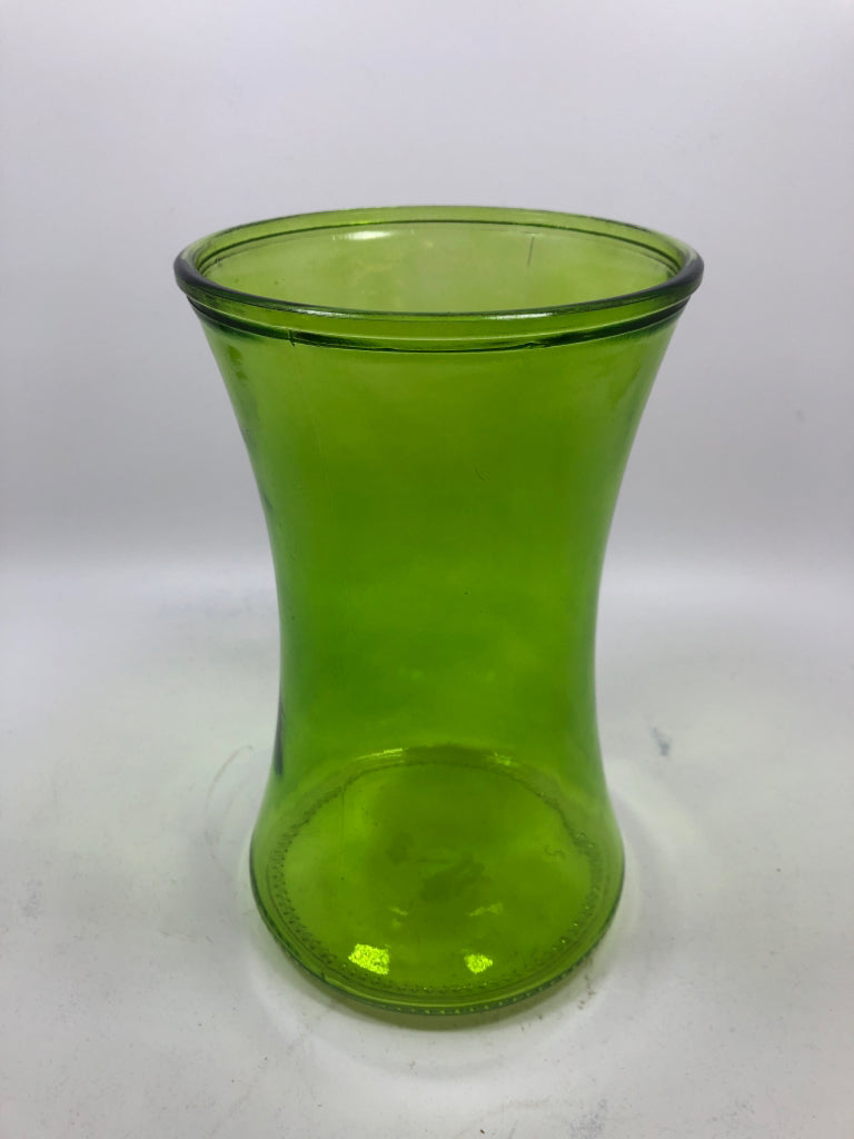 FLARED GREEN GLASS HOURGLASS VASE.