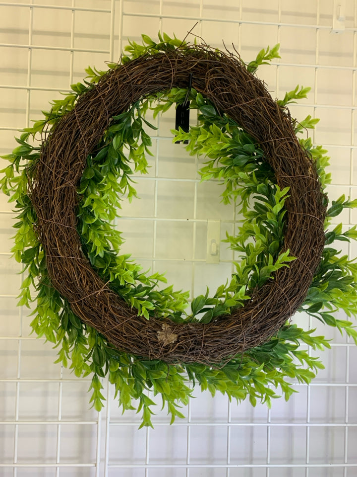 FAUX GREENERY WREATH W/TWIG BASE.