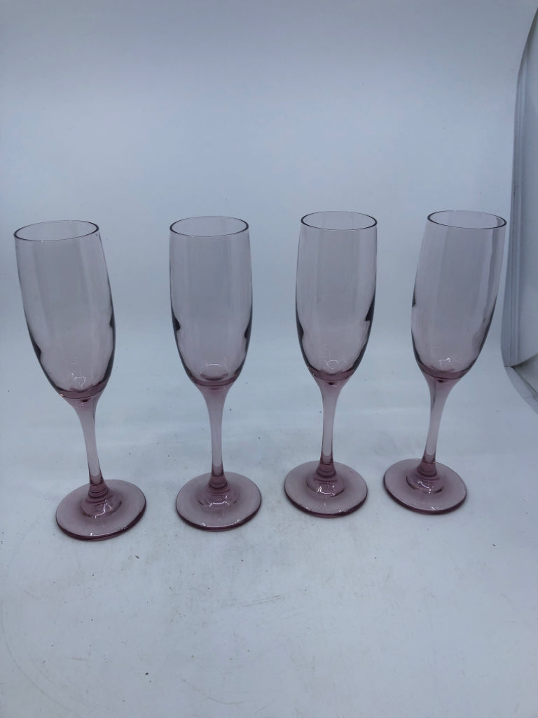 4 PINK TINTED CHAMPAGNE FLUTES.