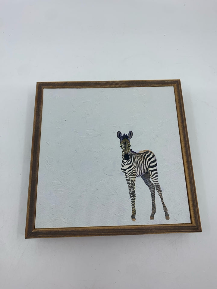 ZEBRA IN WOOD FRAME WALL HANGING.