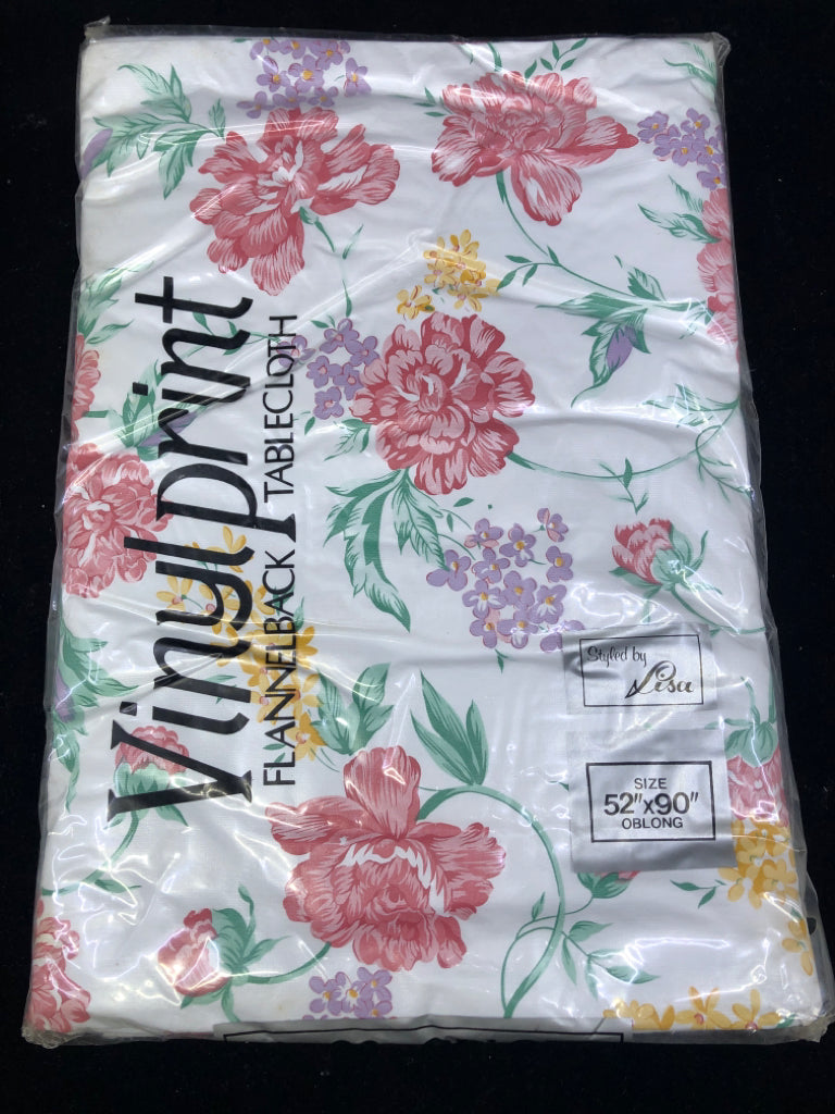 NIP FLORAL VINYL TABLE CLOTH.