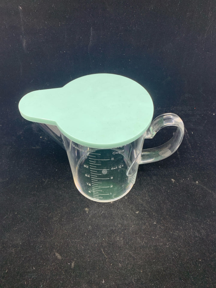 PLASTIC MEASURING CUP/POURING- TEAL COVER.