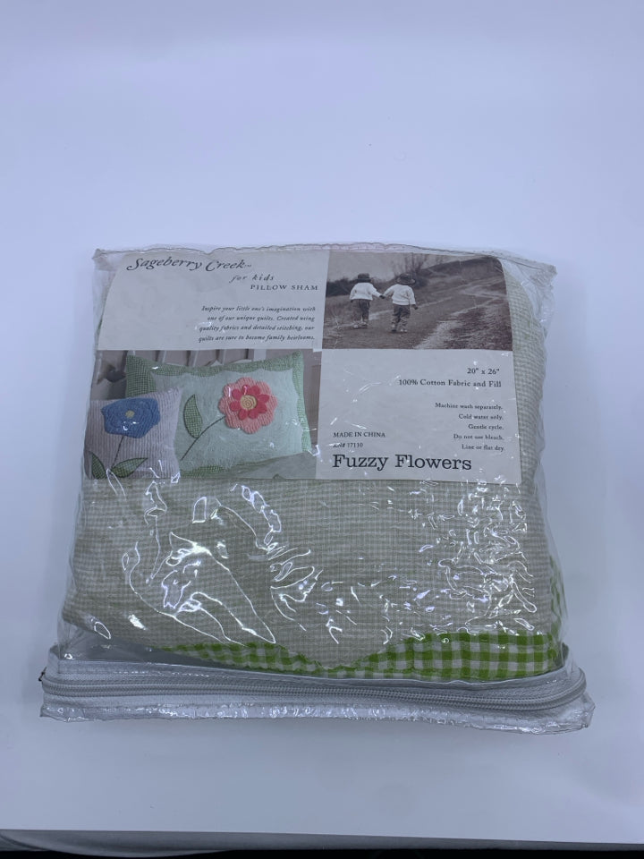 NIP FUZZY FLOWERS PILLOW SHAMS.