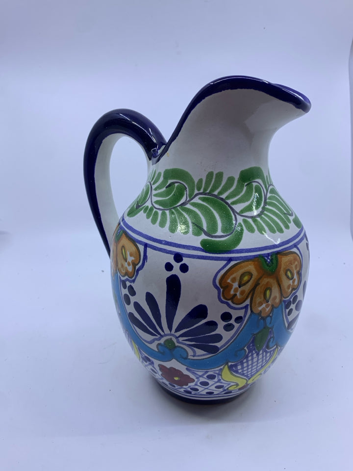 BLUE AND MEXICAN POTTERY PITCHER.