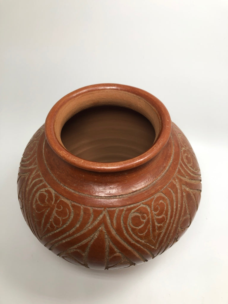 HEAVY RED CARVED POTTERY VASE.