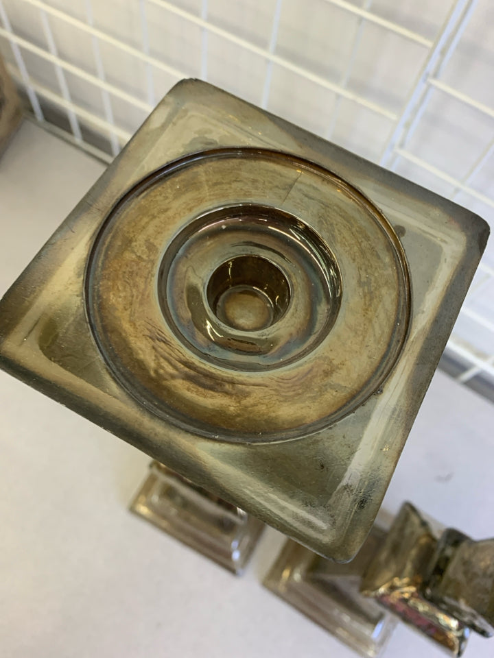 2 GOLD IRIDESCENT GLASS CANDLE HOLDER.