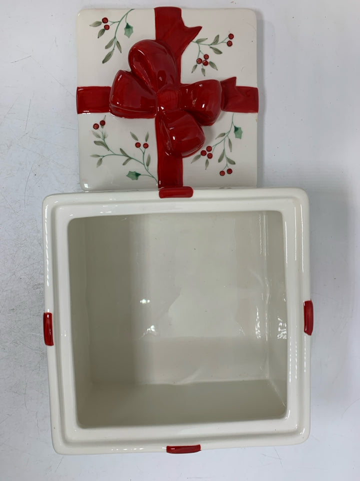 CERAMIC MISTLETOE PRESENT CANISTER W/ RED BOW.