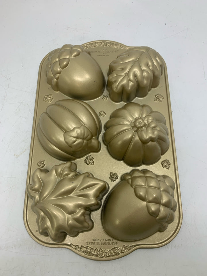 NORDIC WARE CAST ALUMINUM AUTUMN TREATS CAKELET PAN GOLD.