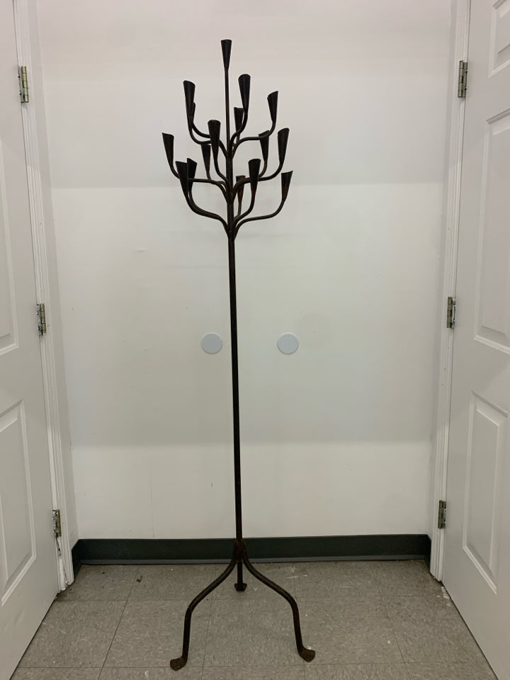 HEAVY WROUGHT IRON STANDING 16 SLOT TAPERED CANDLE HOLDER.