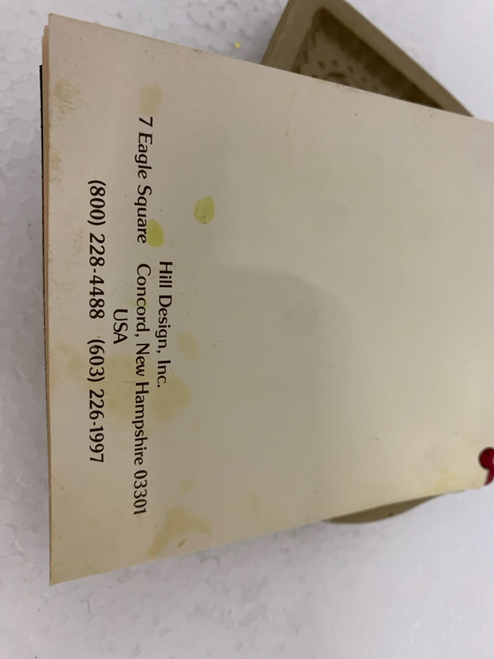 HEART SHAPED STONEWARE COOKIE PRESS BROWN BAG.