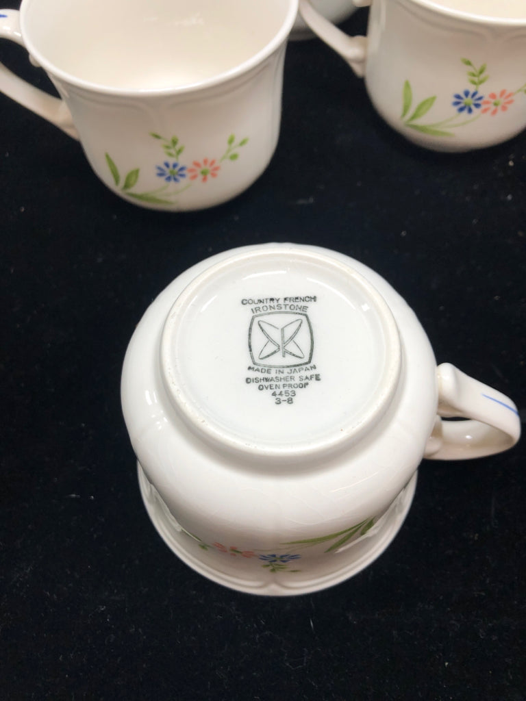 7 COUNTRY FRENCH IRONSTONE FLORAL MUGS.