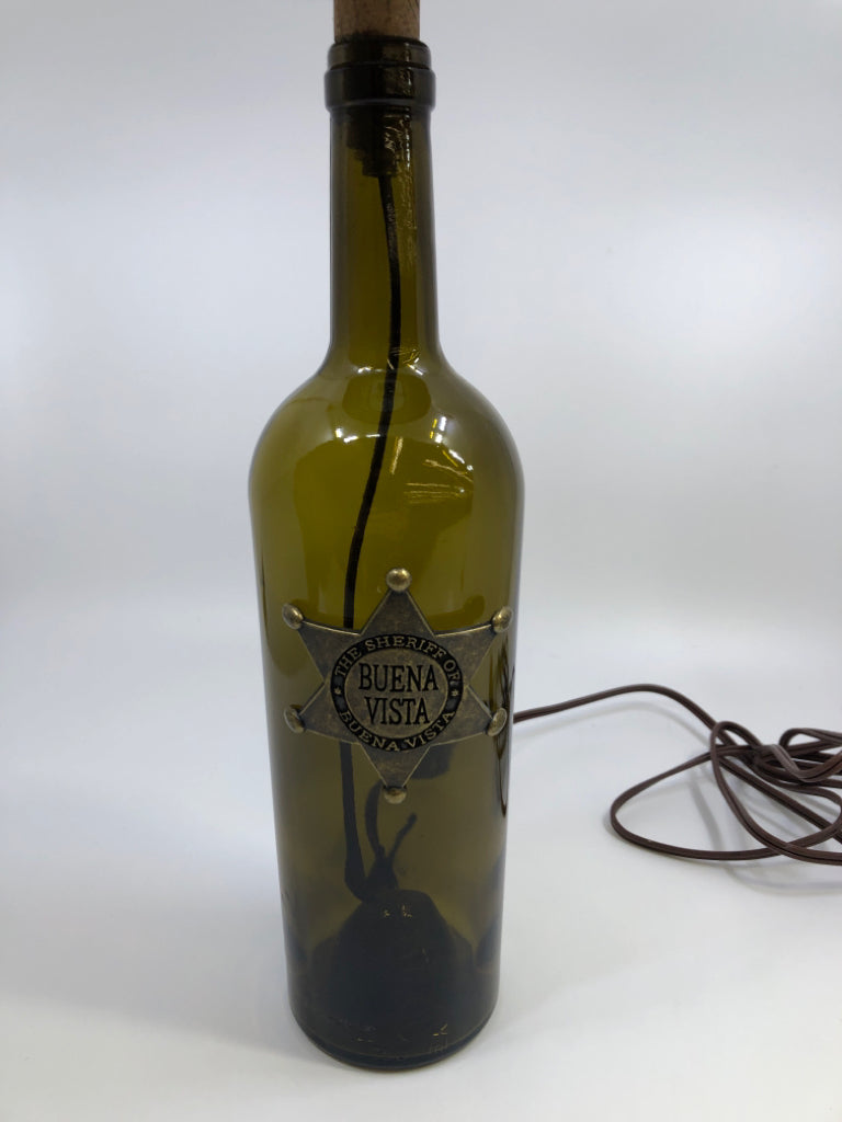 BUENA VISTA SHERIFF BOTTLE LAMP W/BURLAP SHADE.