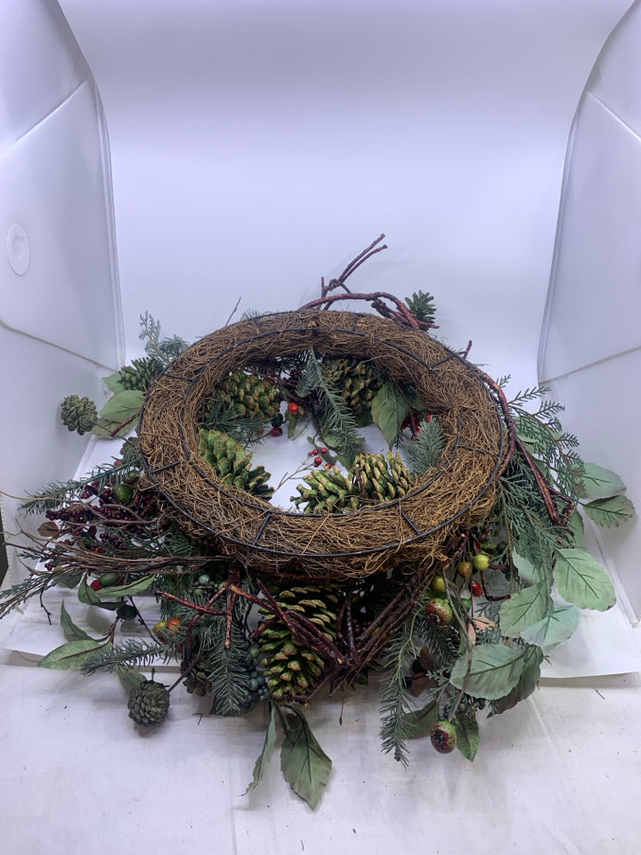 WREATH W BERRIES AND PINE.