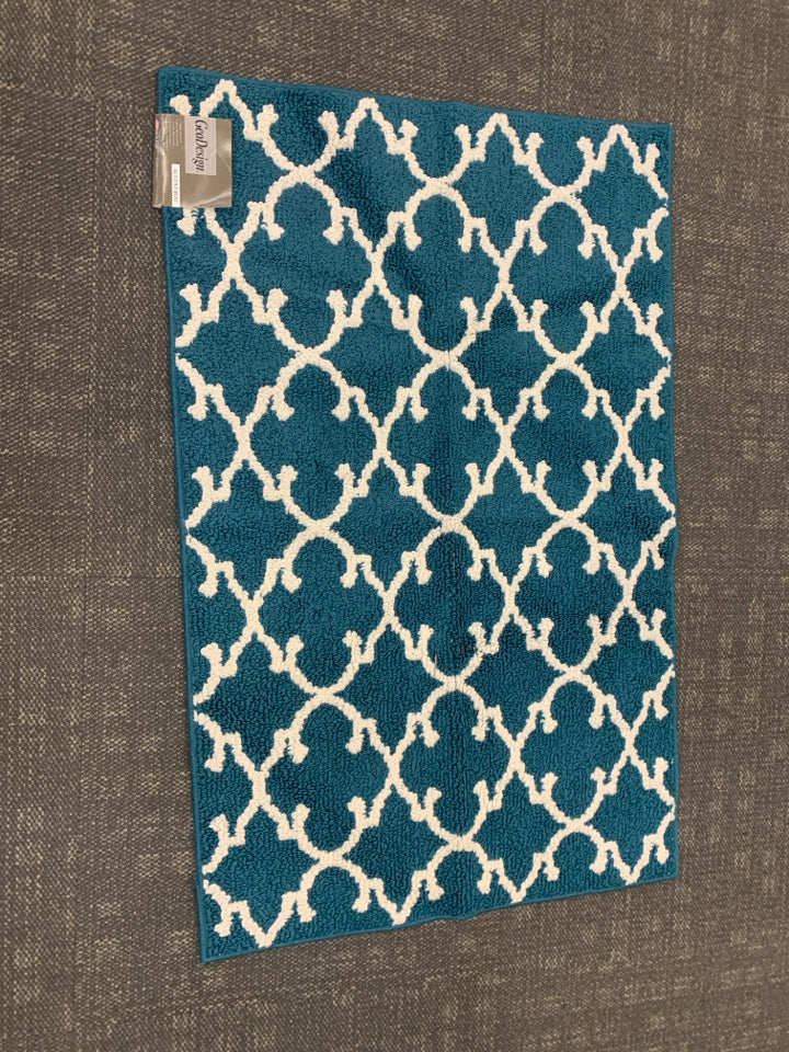 NIP TEAL ACCENT RUG.